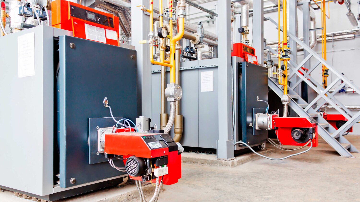Shopping cart in supermarket. Part of shopping trolley in supermarket aisle. Blurred shelves in grocery store and trolley. Copy space for text or design.